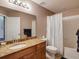Bathroom featuring a vanity with granite top, toilet and a shower with tub at 700 S Harbour Island Blvd # 204, Tampa, FL 33602