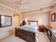 Bedroom with a queen bed, ceiling fan, and bedside table with lamp at 700 S Harbour Island Blvd # 204, Tampa, FL 33602