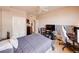 Bright bedroom with a ceiling fan, closet, and a dedicated desk area at 700 S Harbour Island Blvd # 204, Tampa, FL 33602