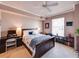 Cozy bedroom featuring a ceiling fan, comfortable bed, and workspace at 700 S Harbour Island Blvd # 204, Tampa, FL 33602