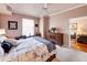 Comfortable bedroom with a cozy bed, wooden dresser, and view to living room at 700 S Harbour Island Blvd # 204, Tampa, FL 33602