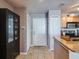 Condo foyer featuring a neutral color palette, tiled flooring, closet space, and a partial kitchen view at 700 S Harbour Island Blvd # 204, Tampa, FL 33602