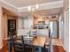 A modern kitchen with stainless steel appliances and a breakfast bar connects to the dining area at 700 S Harbour Island Blvd # 204, Tampa, FL 33602