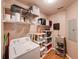 Functional laundry room with washer and dryer, shelving and storage for supplies at 700 S Harbour Island Blvd # 204, Tampa, FL 33602