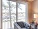 Comfortable living room with view through large windows and stylish chair at 700 S Harbour Island Blvd # 204, Tampa, FL 33602
