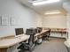 Functional office space with desks, computers, and shelving, perfect for work or study at 700 S Harbour Island Blvd # 204, Tampa, FL 33602