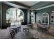 Inviting outdoor patio with comfortable seating and views of the city skyline and lush tropical landscaping at 700 S Harbour Island Blvd # 204, Tampa, FL 33602