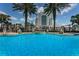 Resort-style pool area, framed by swaying palm trees and offering breathtaking views of the city at 700 S Harbour Island Blvd # 204, Tampa, FL 33602