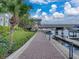 Beautiful waterfront walkway features lush landscaping, creating a tranquil atmosphere by the water at 700 S Harbour Island Blvd # 204, Tampa, FL 33602