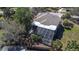 Aerial view of the home with a pool and screened-in porch at 733 Seminole Blvd, Tarpon Springs, FL 34689