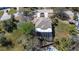 Aerial image of home with a screened in pool and backyard at 733 Seminole Blvd, Tarpon Springs, FL 34689