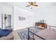 Bedroom featuring a ceiling fan, wood floors, and lots of space at 733 Seminole Blvd, Tarpon Springs, FL 34689