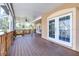 Covered patio features French doors to interior, offering a seamless indoor-outdoor living experience at 733 Seminole Blvd, Tarpon Springs, FL 34689