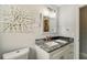 Bathroom featuring granite vanity and contemporary decor at 7505 Exter Way, Tampa, FL 33615