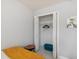 Bedroom with a bed, open closet, and simple decor at 7505 Exter Way, Tampa, FL 33615