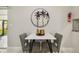 Stylish dining area with modern table set and decorative wall art at 7505 Exter Way, Tampa, FL 33615