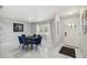 Bright dining room features modern lighting, decor, and window at 7505 Exter Way, Tampa, FL 33615