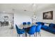 Stylish living space featuring modern décor, a dining table, and an accent wall at 7505 Exter Way, Tampa, FL 33615