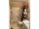 Bathroom showcasing a bathtub/shower, with decoratively placed greenery and floral arrangements atop the commode at 8220 112Th St # 202, Seminole, FL 33772