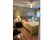 Inviting bedroom with a comfortable bed, wooden floors, and relaxing decor at 8220 112Th St # 202, Seminole, FL 33772