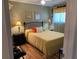 Inviting bedroom with a comfortable bed, wooden floors, and relaxing decor at 8220 112Th St # 202, Seminole, FL 33772