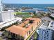 Aerial view of the complex featuring a pool, landscaping and proximity to the harbor, parks, and downtown at 100 4Th S Ave # 208, St Petersburg, FL 33701