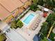 Aerial view showcasing a community pool, surrounding amenities, and the well-maintained residential buildings at 100 4Th S Ave # 208, St Petersburg, FL 33701