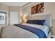 Comfortable bedroom featuring a stylish headboard and tasteful decor, creating a relaxing retreat at 100 4Th S Ave # 208, St Petersburg, FL 33701