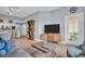 Spacious living room with an open floor plan, seamlessly connecting the kitchen and dining area at 100 4Th S Ave # 208, St Petersburg, FL 33701