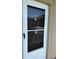 Front door with a combination glass and screen door for ventilation and light at 1000 49Th N St # 309, St Petersburg, FL 33710