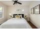 Cozy bedroom featuring a comfortable bed, side tables, and modern decor at 1008 E Norfolk St, Tampa, FL 33604