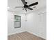 Bedroom with ceiling fan and wood flooring at 1008 E Norfolk St, Tampa, FL 33604