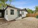 Charming home with well-maintained landscaping and a private driveway at 1008 E Norfolk St, Tampa, FL 33604