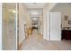 Foyer with tile flooring, high ceilings, neutral walls and a decorative glass door at 11218 Coventry Grove Cir, Lithia, FL 33547