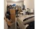 Cluttered garage interior showcasing potential storage and parking area at 11218 Coventry Grove Cir, Lithia, FL 33547