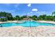 Community pool area with a playful pirate-themed water park feature at 11218 Coventry Grove Cir, Lithia, FL 33547