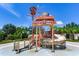 Fun pirate ship water park feature with slide and water play area at 11218 Coventry Grove Cir, Lithia, FL 33547