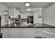 Kitchen view showcasing sleek countertops, modern appliances, and a functional layout at 12041 Hoosier Ct # 104, Hudson, FL 34667