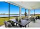 Entertain guests on the lanai with comfortable seating and scenic waterfront views at 12785 Jade Empress Loop # 102, Venice, FL 34293