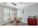 Cozy dining area with plenty of natural light, perfect for enjoying casual meals with Gathering and friends at 135 Cabana Way, Rotonda West, FL 33947