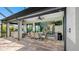 Expansive screened patio with seamless indoor-outdoor flow and lots of seating at 135 Cabana Way, Rotonda West, FL 33947