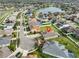 Aerial view of home on large lot surrounded by well-maintained neighborhood at 13908 Artesa Bell Dr, Riverview, FL 33579