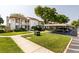 Well-maintained condo building with a carport and nicely landscaped lawn area at 142 Lakeview Way # 142, Oldsmar, FL 34677