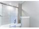 Shower with tiled walls, modern fixtures, and a sleek glass door at 14477 Editors Note St, Ruskin, FL 33573