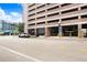 Street view of building with garage entrance, showcasing the urban location with retail nearby at 175 2Nd S St # 1014, St Petersburg, FL 33701