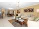 Spacious living room with open floor plan and stylish furnishings at 17950 Beaming Rays Ln, Lutz, FL 33558