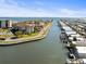 High angle aerial view of waterfront homes with boat docks in a tranquil and picturesque canal setting at 19029 Us Highway 19 N # 2-17, Clearwater, FL 33764
