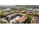 A beautiful aerial view of the condominium complex showing the convenient parking and wonderful neighborhood at 19029 Us Highway 19 N # 2-17, Clearwater, FL 33764