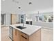 Contemporary kitchen with large island, stainless steel appliances and plenty of natural light at 1972 Sourwood Blvd, Dunedin, FL 34698