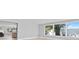 Open-concept living area with backyard views at 1972 Sourwood Blvd, Dunedin, FL 34698